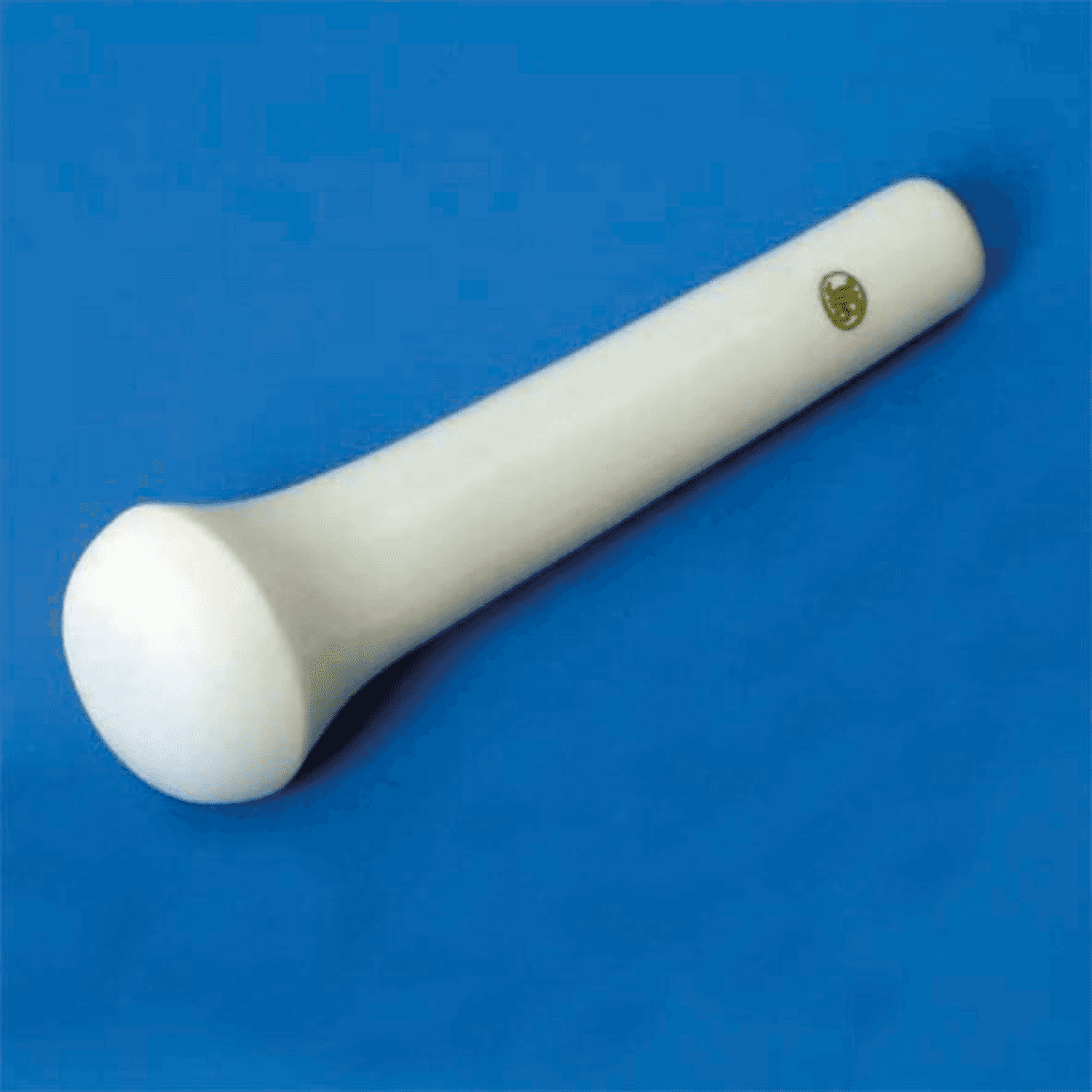 Pilon en porcelaine tête biscuit