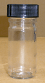 Flacon poudrier en verre avec cape à vis